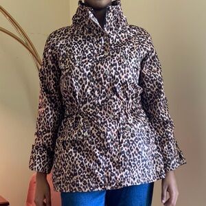 Cheetah Print windbreaker jacket with red lining.